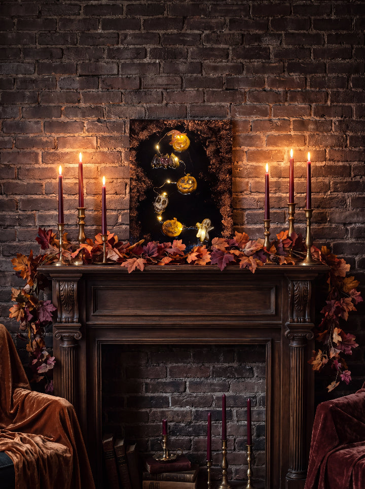 The Midnight Portal illuminated panel above an autumn-decorated fireplace