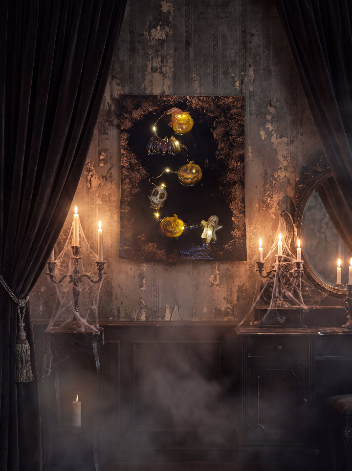 The Midnight Portal LED resin art panel on the wall in a candlelit Halloween room