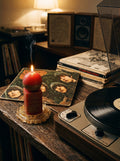 "Word Is Love" handcrafted beeswax candle in Pompeian Red on resin stand